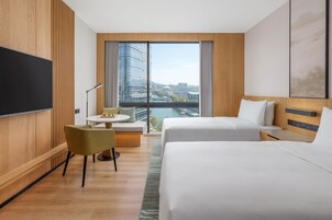 Room, 2 Twin Beds, City View | Down comforters, minibar, in-room safe, individually furnished