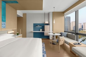 Habitación Deluxe, 1 cama King size, vista a la ciudad | Edredón, minibar y caja de seguridad en la habitación