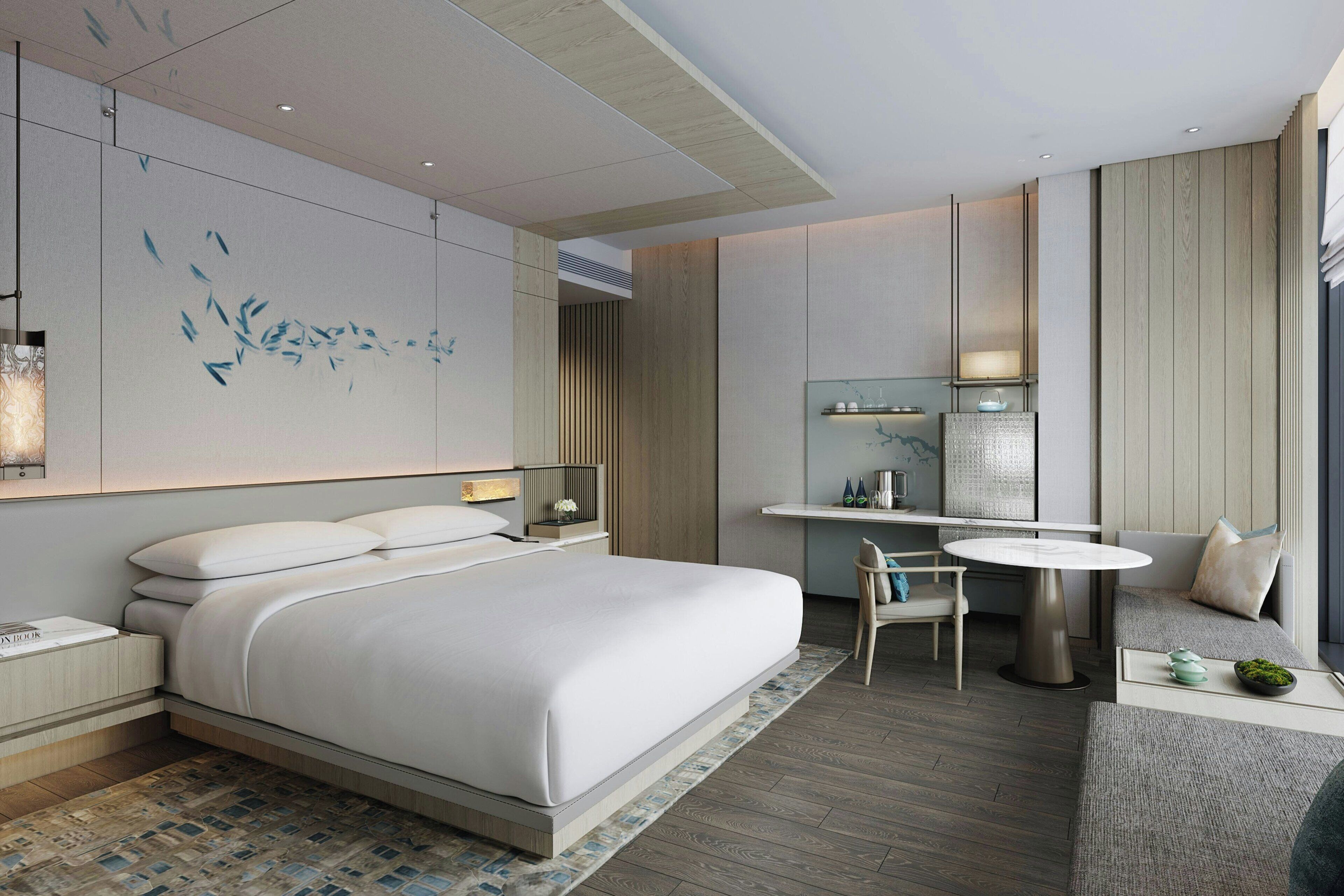 Edredones de plumas, minibar, caja fuerte y mobiliario individual