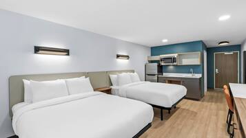 Desk, laptop workspace, free WiFi, bed sheets