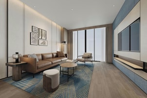 Business Suite, 1 King Bed, City View | Living room