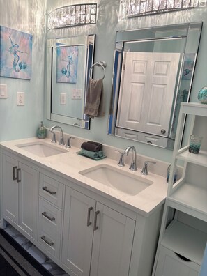 A bathroom with two sinks, a towel rack, and a mirror. - 3BR Less then 5 minutes from Downtown, Hospitals & Mall (St. John's)