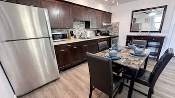 Coffee/tea maker, fridge, microwave, oven
