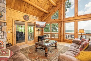 TV, fireplace - Lakeshine Chalet: Stunning View + Hot Tub + Fire Pit! (McHenry)