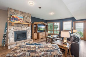 TV, fireplace - Lakeshine Chalet: Stunning View + Hot Tub + Fire Pit! (McHenry)