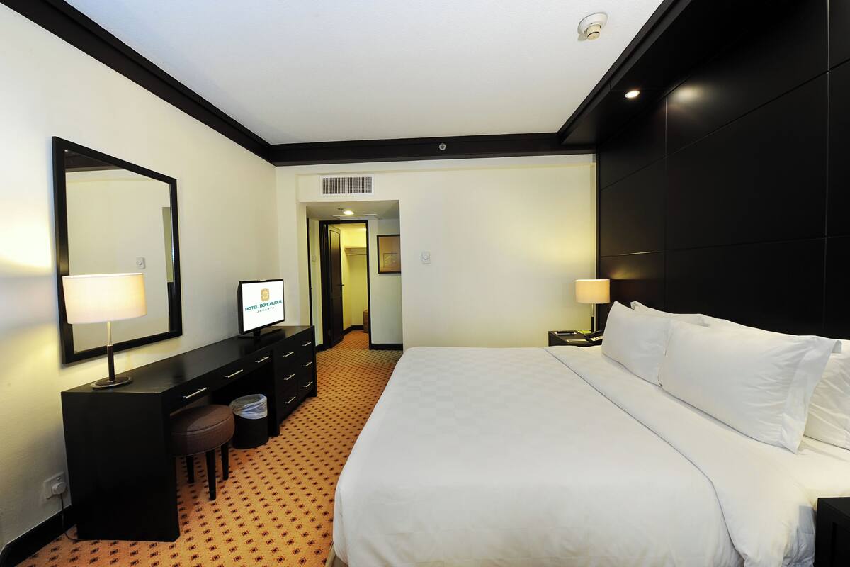 Family Apartment, Balcony, Pool View | In-room safe, desk, iron/ironing board, free WiFi