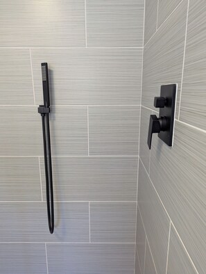 Shower, hair dryer, towels, soap - Modern Raleigh Downtown Rooftop Skyline View SFH-R (Raleigh)