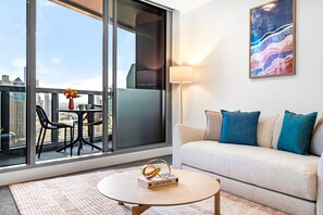 Living room - Modern City Views Escape With Gym Access (Melbourne)