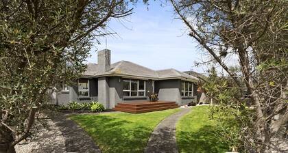 Relaxed Bayside Stay With Outdoor Space