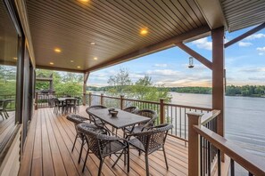 Outdoor dining - Water's Edge!  11 Bdrm, 5.5 Bath, Lakefront, Dock, Sleeps 35, Hot Tub, IR Sauna (Lake Harmony)