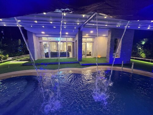 Luxury 7-Bedroom Smart House with Resort-Style Heated Pool + Waterfall + Garden