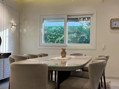Luxury 7-Bedroom Smart House with Resort-Style Heated Pool + Waterfall + Garden