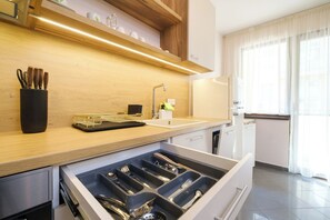 Fridge, microwave, oven, stovetop - 2-Bedroom Apartment in the City Center (Plovdiv)