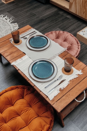 Classic Chalet, Garden View (Refuge Astral) | Living area | Fireplace - Domaine à Ciel Ouvert (La Malbaie)