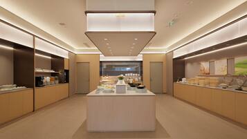 Daily buffet breakfast (USD 10 per person)