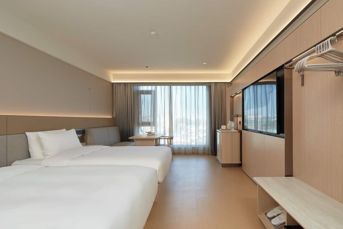 Habitación superior con 2 camas individuales | Ropa de cama de alta calidad y caja de seguridad en la habitación