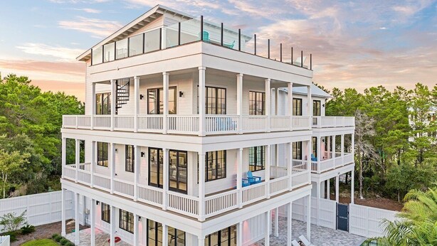 A multi-story house with a pool, featuring balconies and a covered patio area. - GULF VIEWS! Game Room, Private Pool, LSV/Golf Cart, Bikes! Sleeps 24 (Rosemary Beach)