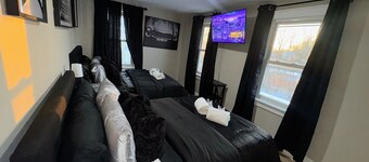 Spacious 3BR Home • Sleeps 12 • 10 Mins to Airport