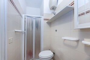 Chuveiro, secador de cabelo