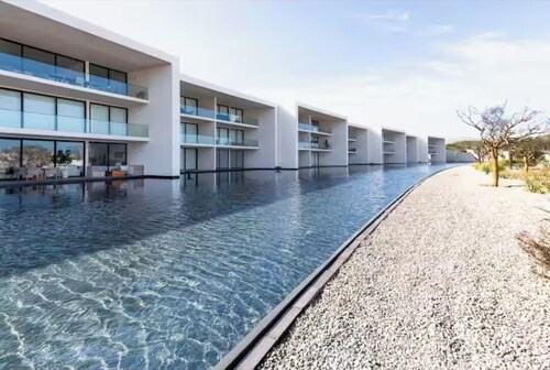 New luxury 3 bdrm condo with sea and golf course views on Campestre Golf Course
