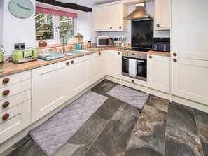 Dishwasher, high chair - Charming three-bedroom farmhouse in Yealand Redmayne, near Arnisde. (Yealand Redmayne)