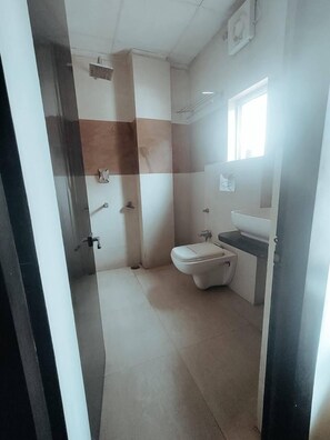 Deluxe Double Room, City View | Bathroom | Shower, slippers, towels, soap