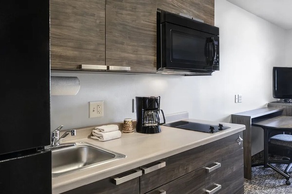 Cook simply with stovetop, microwave, and coffee ready to go.