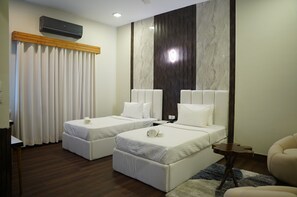 デラックス ツインルーム | ミニバー、WiFi (無料)、ベッドシーツ