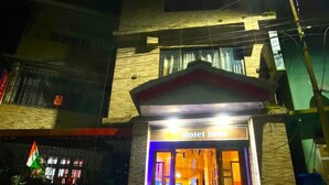 A hotel entrance with a sign reading "Hotel Jada" and a brightly lit facade. - HOTEL JADE ARITHANG GANGTOK (Gangtok)
