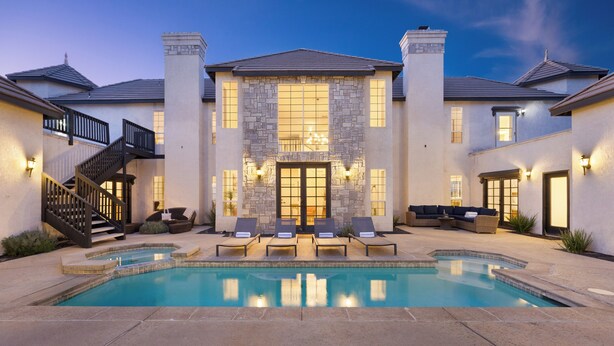 A large house with a swimming pool, a staircase, and outdoor seating. - Hilltop Estate w/ Tennis Court, Pool, Sauna, Game Room, Theater, Panoramic Views (Temecula)