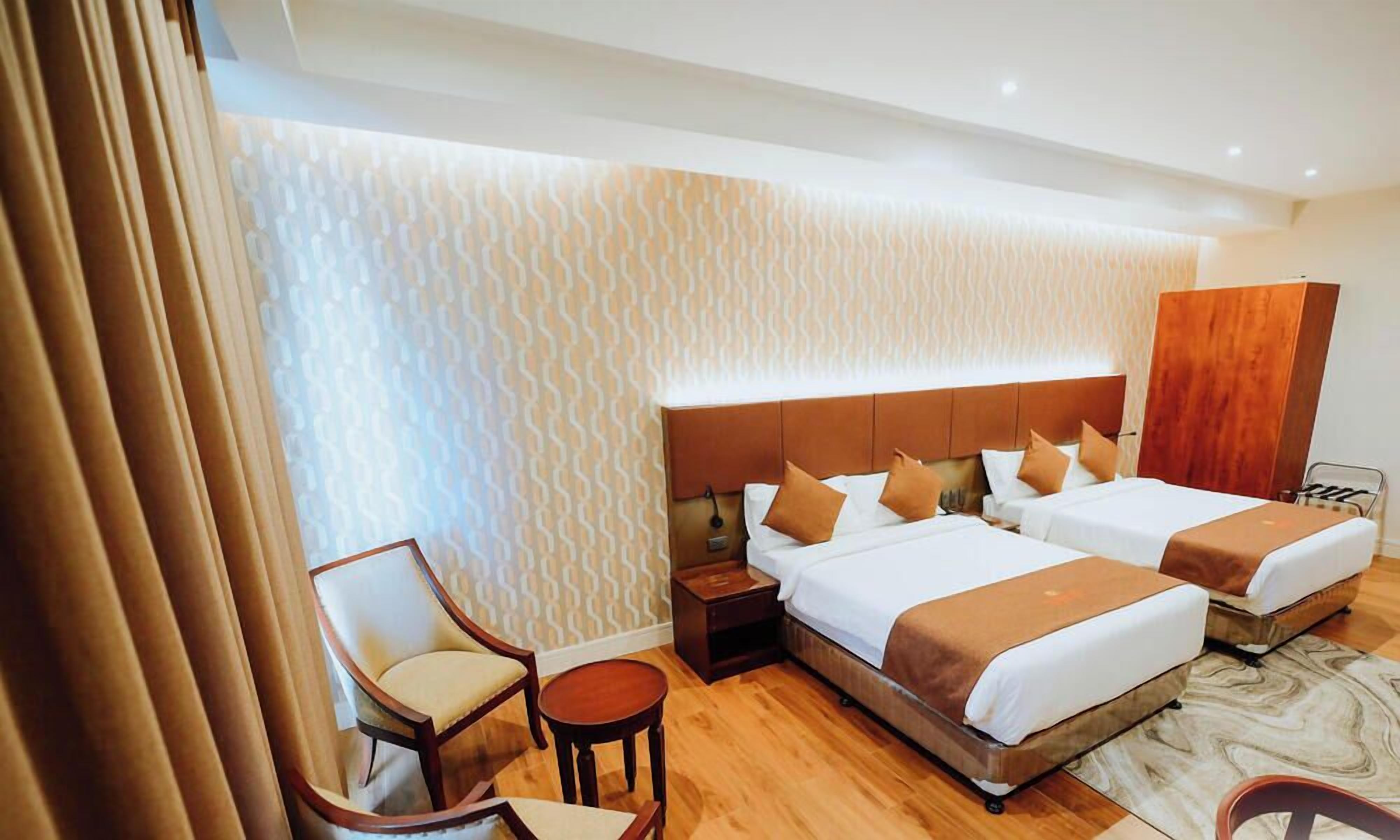 Chambre Standard double ou avec lits jumeaux | Minibar, accès au Wi-Fi (inclus), literie fournie