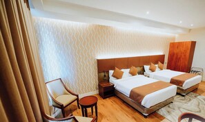 Chambre Standard double ou avec lits jumeaux | Minibar, accès au Wi-Fi (inclus), literie fournie