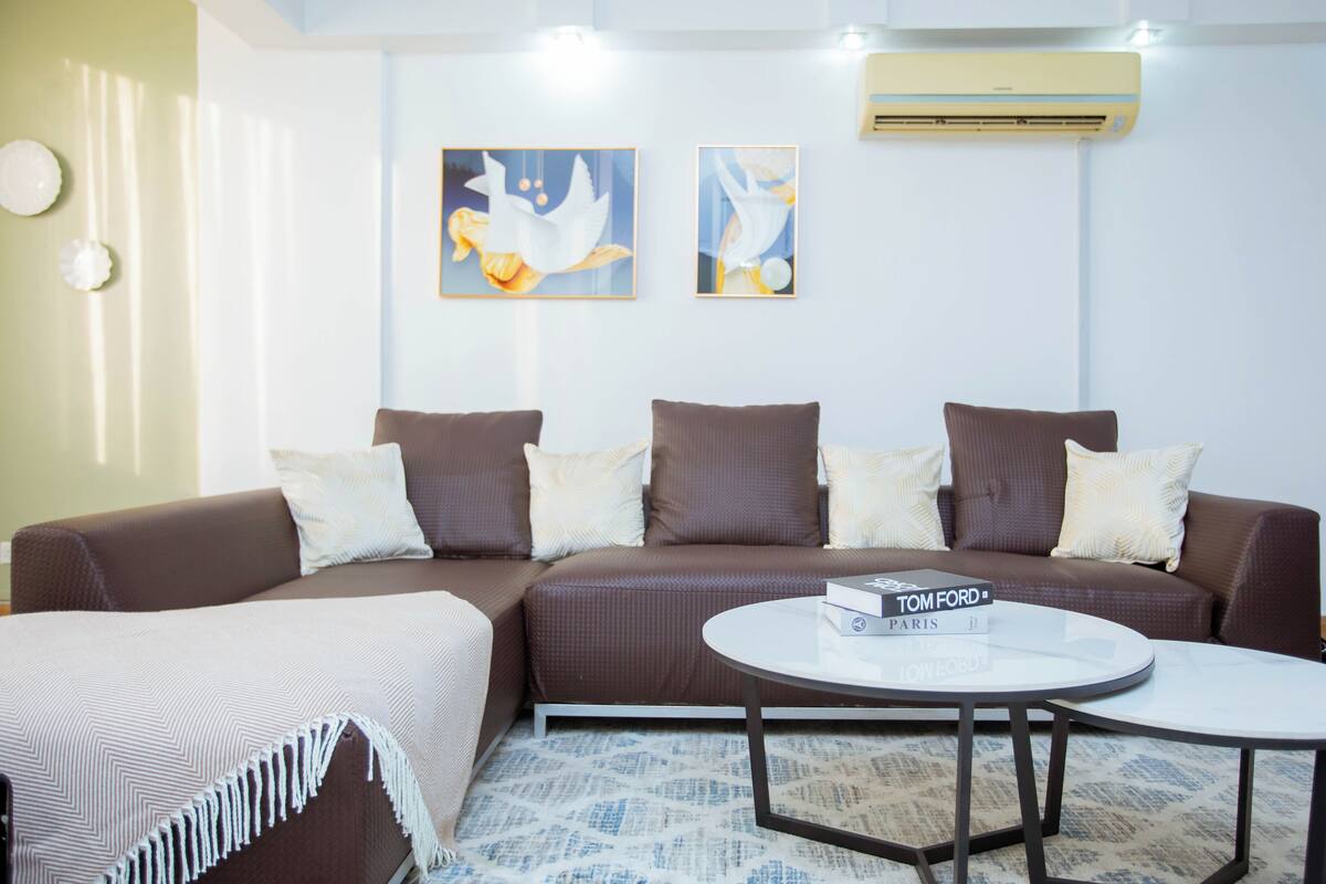 Comfort Triple Room | Living area | Flat-screen TV