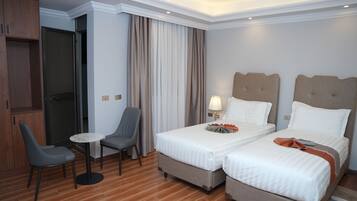 Superior Twin Room, City View | Desk, laptop workspace, iron/ironing board, free WiFi