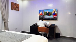 Luxury Single Room, City View | In-room safe, desk, laptop workspace, blackout drapes