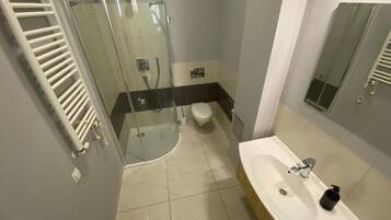 Hair dryer, towels, soap, toilet paper