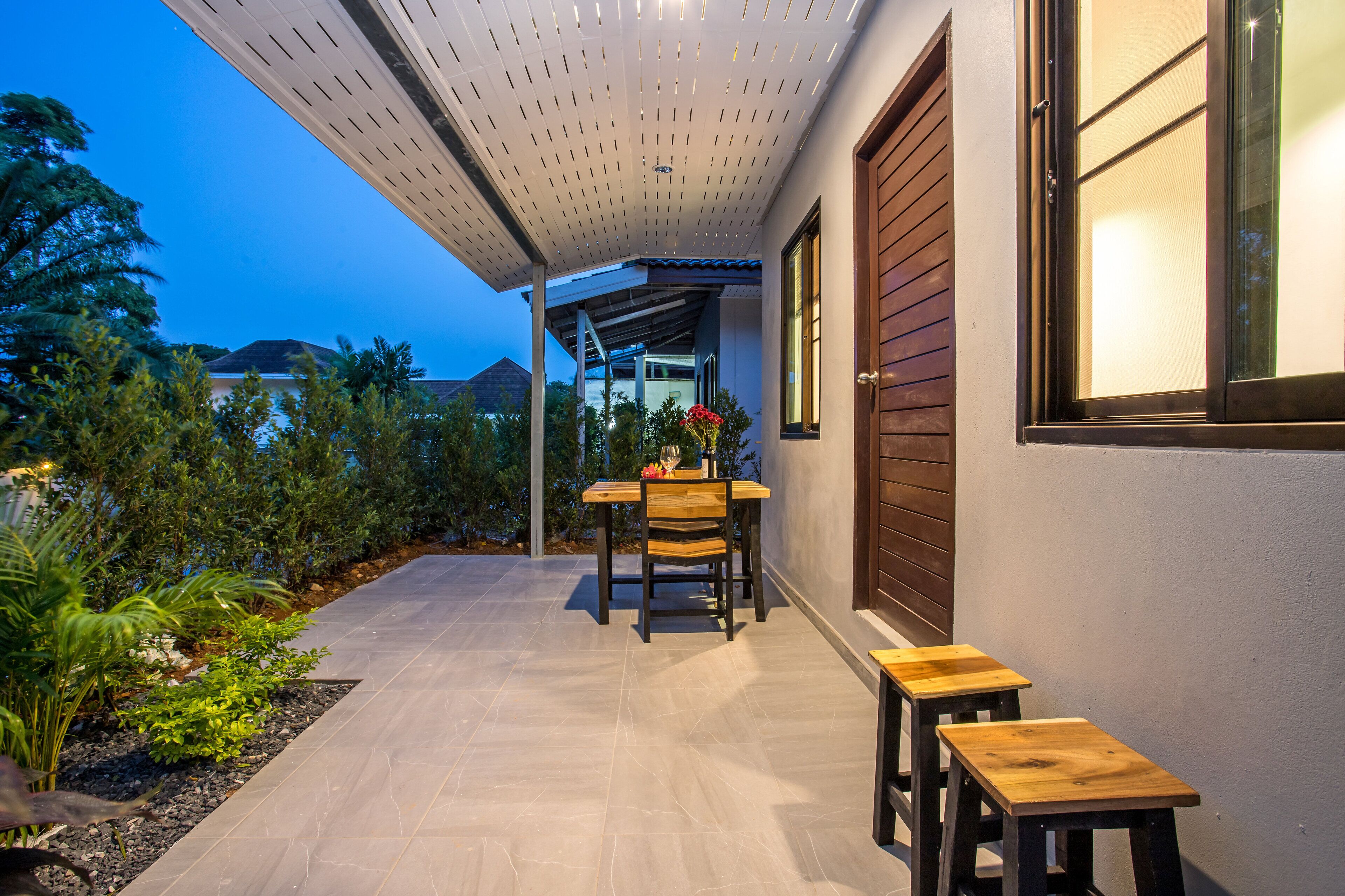 Deluxe bungalow, uitzicht op tuin | Terras