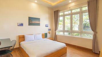 Superior Room, 1 King Bed, Garden View | Desk, laptop workspace, free WiFi