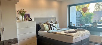 Apartamento "Donde Negocios y Relax se Encuentran" con Terraza, Jardín y Wi-Fi