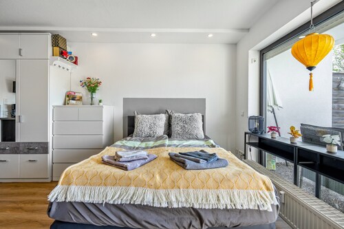 Apartment „Where Business and Relaxing Meet“ mit Terrasse, Garten & WLAN