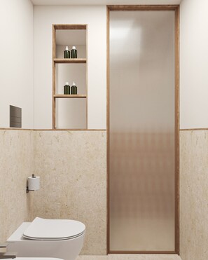 Appartement Classique, vue jardin | Salle de bain | Douche, serviettes fournies, savon, shampoing