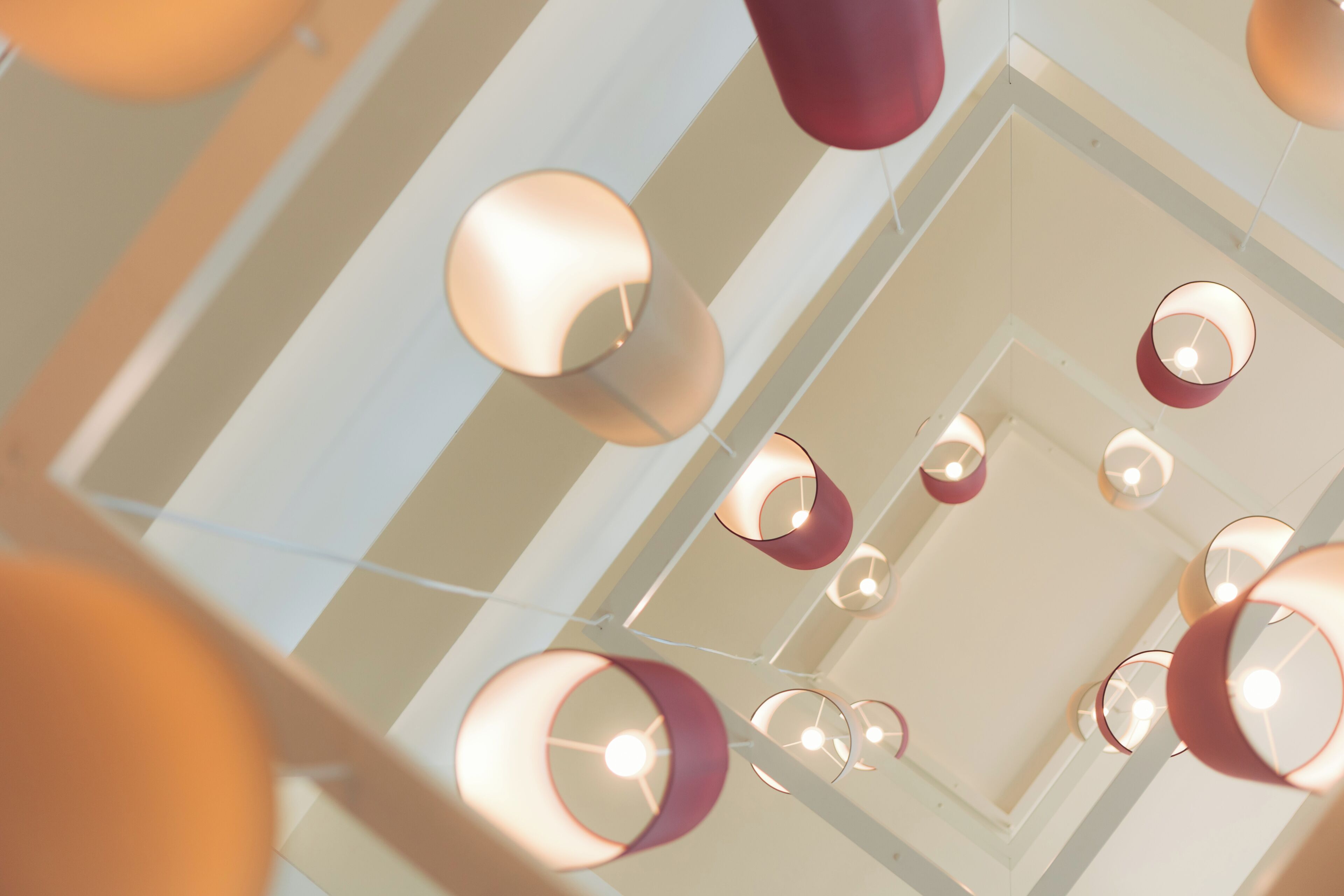 A ceiling with multiple spherical light fixtures.
