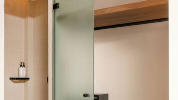 Duplex Family Suite, Pool View | Bathroom | Shower, free toiletries, hair dryer, towels