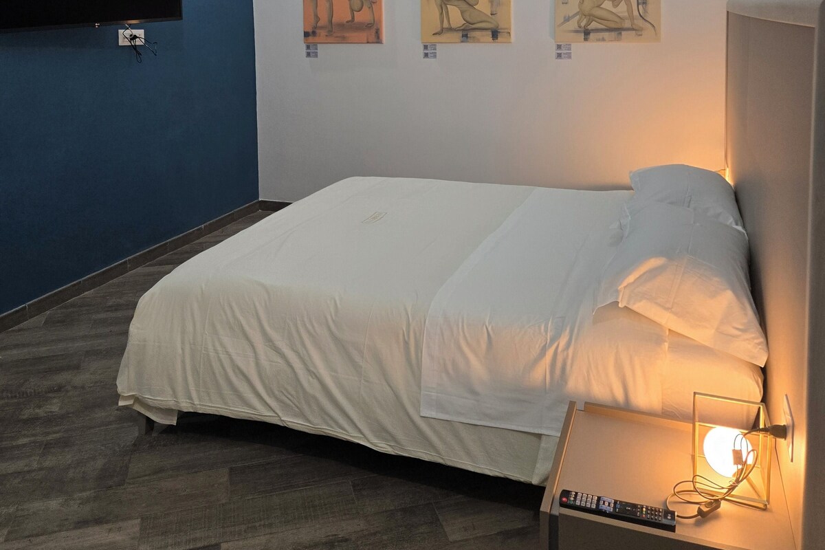 Camera Deluxe con letto matrimoniale o 2 letti singoli | Wi-Fi gratuito