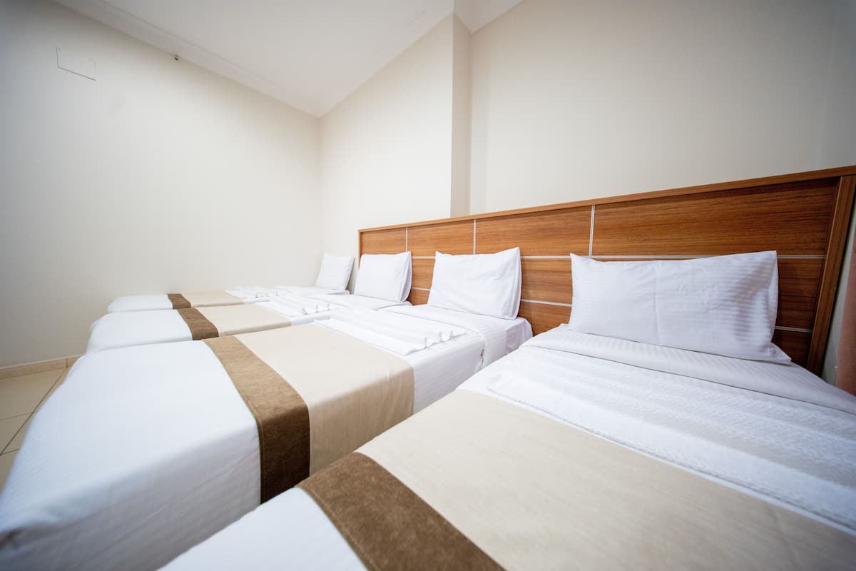 Quadruple Room | Minibar, iron/ironing board, free WiFi, bed sheets