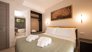 Minibar, desk, blackout curtains, iron/ironing board