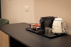 Minibar, desk, blackout drapes, iron/ironing board