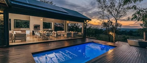 Outdoor pool, pool umbrellas, sun loungers