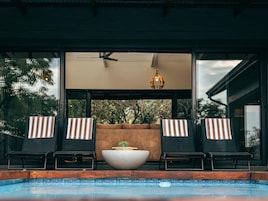 Outdoor pool, pool umbrellas, sun loungers