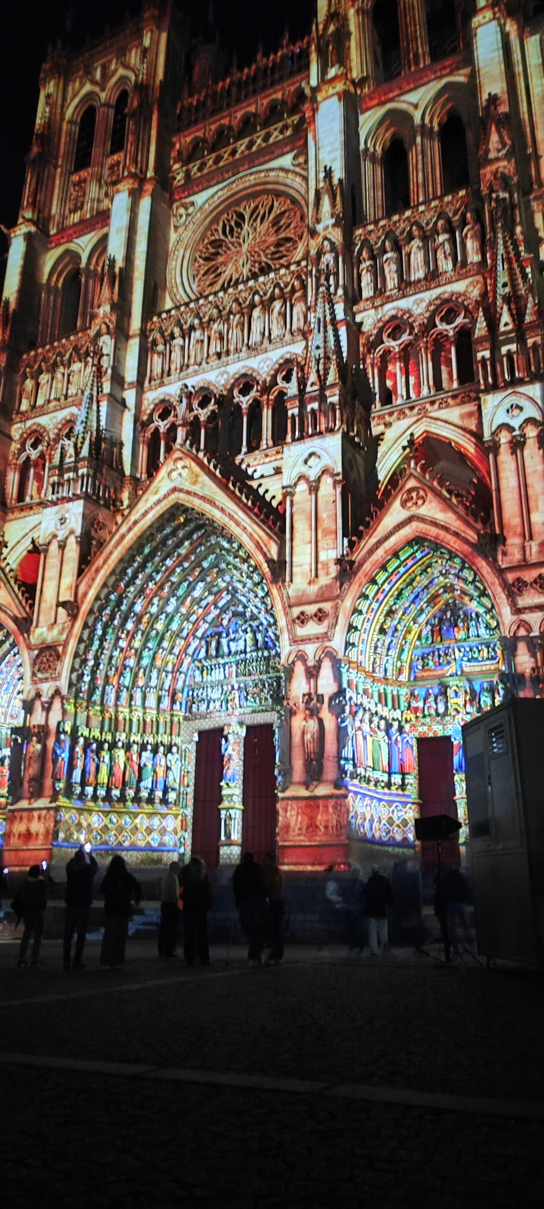 A cathedral with intricate stained glass windows and detailed architecture.